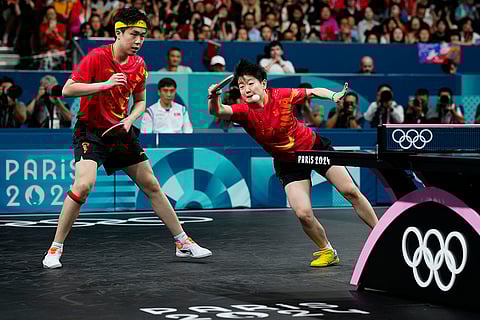 Mixed doubles gold medal table tennis match between China and North Korea